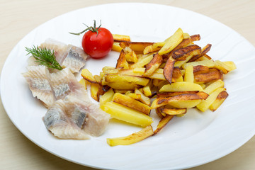 Roasted potato with herring fillet