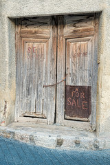 Old door with handwriten "for sale"