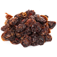 Dried black cherry-plum. Isolated. Macro. Selective focus.