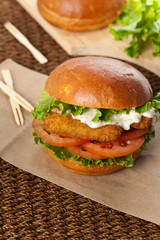 Breaded Fish burger. Selective focus.