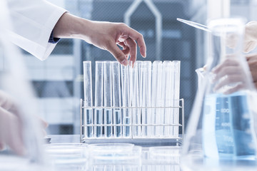Test tube, researcher, lab coat