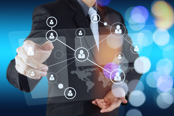 businessman hand showing human icon flow chart on new modern com