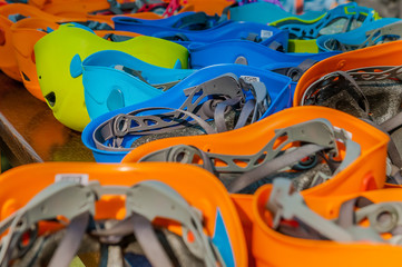 Saftey helmets in different colors into an adventure park