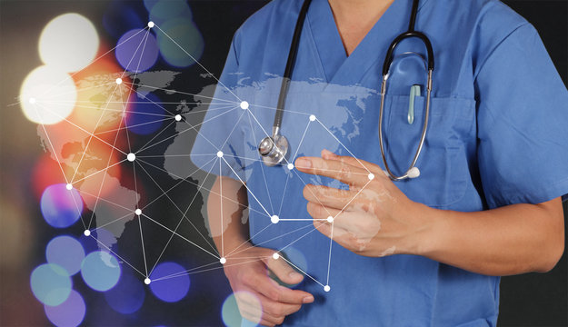 smart medical doctor hand showing network with bokeh exposure as