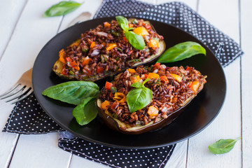 Stuffed eggplant with red rice and vegetables