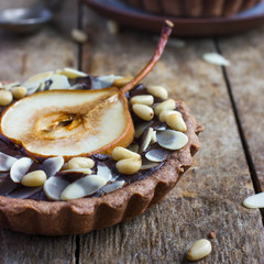 chocolate tartlets with pear and nuts