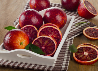 Fresh blood oranges in  white box