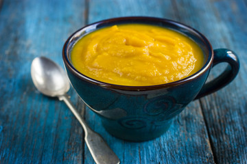 pumpkin soup on a bowl