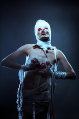 Naklejka premium Image of strange looking girl dressed as zombies