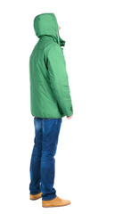 Back view of handsome man in winter jacket  looking up. © ghoststone