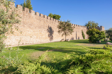 Fototapeta na wymiar The ancient city walls of Evora