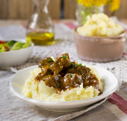 Duck filet in gravy with vanilla served with mashed potatoes