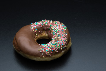 doughnut with color sprinkles