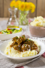 Duck filet in gravy with vanilla served with mashed potatoes