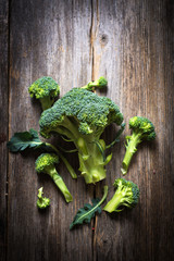 Fresh green broccoli on wooden background