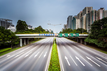 Fast blurry car on highway