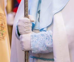 Nazareno holding a cross in his hands during Holy Week