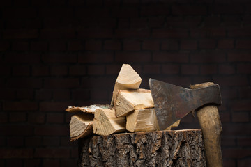 birch firewood, old rusty ax