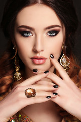 beautiful young woman with  dark hair with bijou