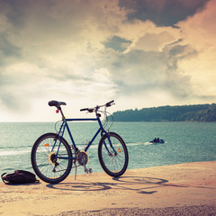 Fototapeta premium Bicycle stands on concrete pier, Black Sea coast