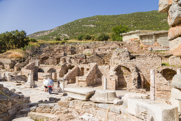 Fototapeta na wymiar Ancient Ephesus. Tourists visiting the ruins