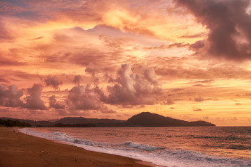 Fototapeta na wymiar Sunset on Mai Khao beach in Phuket