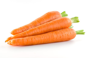Carrot. Heap of vegetable isolated on white - obrazy, fototapety, plakaty