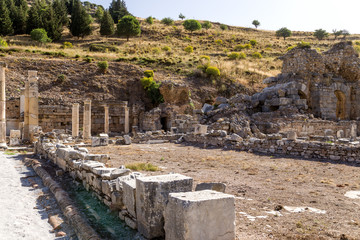 Fototapeta na wymiar Ruins of ancient buildings in Ephesus, Turkey. (UNESCO list)