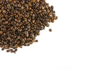 Top view of roasted coffee beans isolated on white background