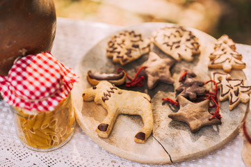 Christmas homemade gingerbread cookies on wooden table