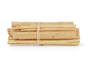 tied true ceylon cinnamon sticks, isolated