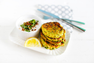 Vegetarian fritters, zucchini burgers with coconut yogurt