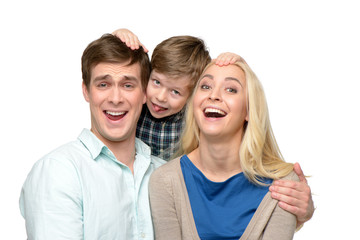 Cheerful family of three having fun