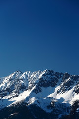 Fototapeta na wymiar Verscheinter Gipfel in den Alpen