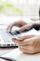 woman typing document in an office