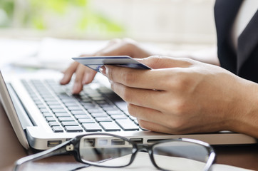woman typing document in an office