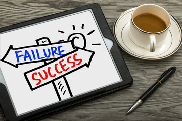 success or failure signpost hand drawing on tablet pc