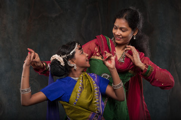 pretty girls in traditional costumes