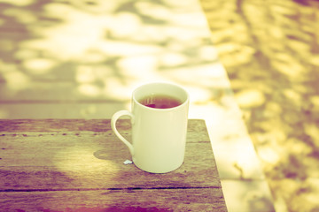 Tea cup on wood - Vintage effect style pictures