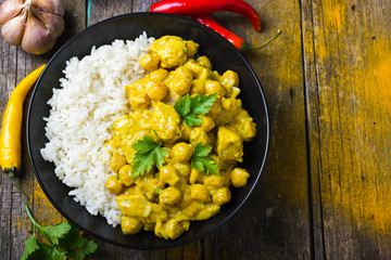 Spicy chicken and chickpeas curry and rice - obrazy, fototapety, plakaty