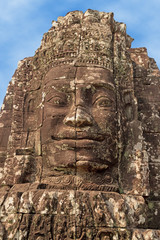 Buddha face carved in stone