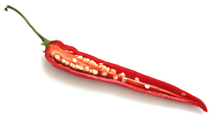 Naklejka premium Sliced chili pepper with seeds visible.