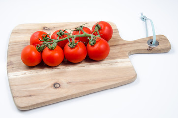 Tomatoes on wooden table