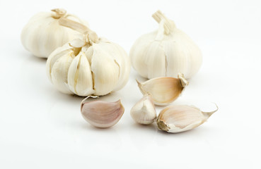 cloves of garlic isolated on white background