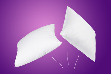 White cushions fly up