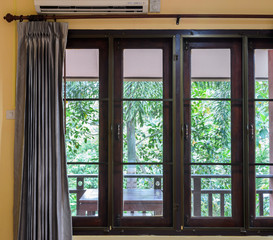 Closed window with curtain
