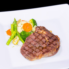 Cooked rib-eye steak