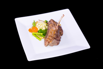 lamb chop meal with potato and carrot