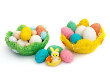 Happy Easter: colored eggs and a cute bunny