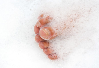 Toes in bath foam